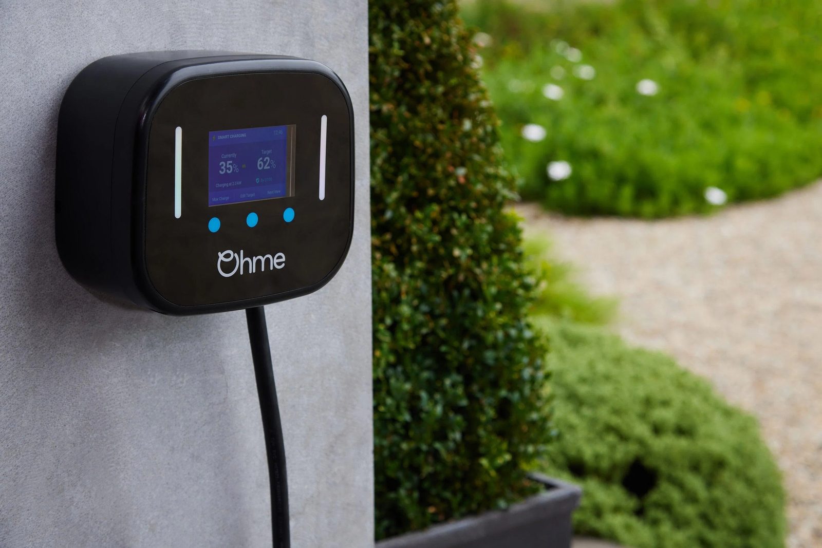 Home EV charge point installed on an exterior wall